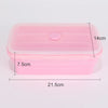 Contenedor de silicona rosa plegable para almacenar alimentos, con 14 cm de alto y 21.5 cm de largo.