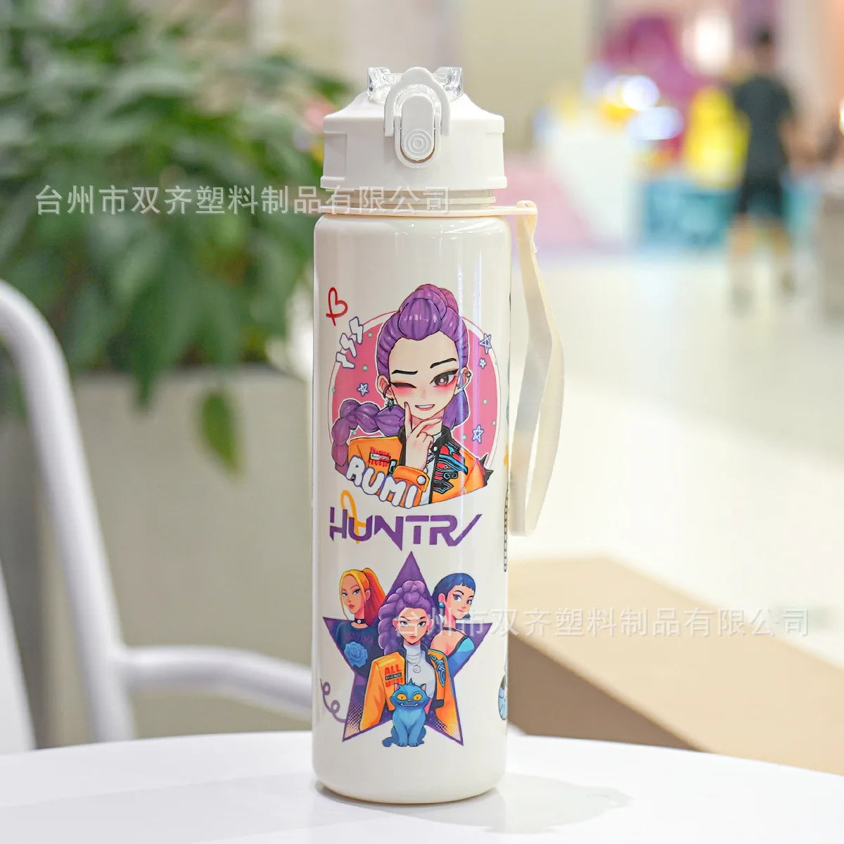 A white insulated water cup featuring a cartoon print of a purple-haired female character and other characters.