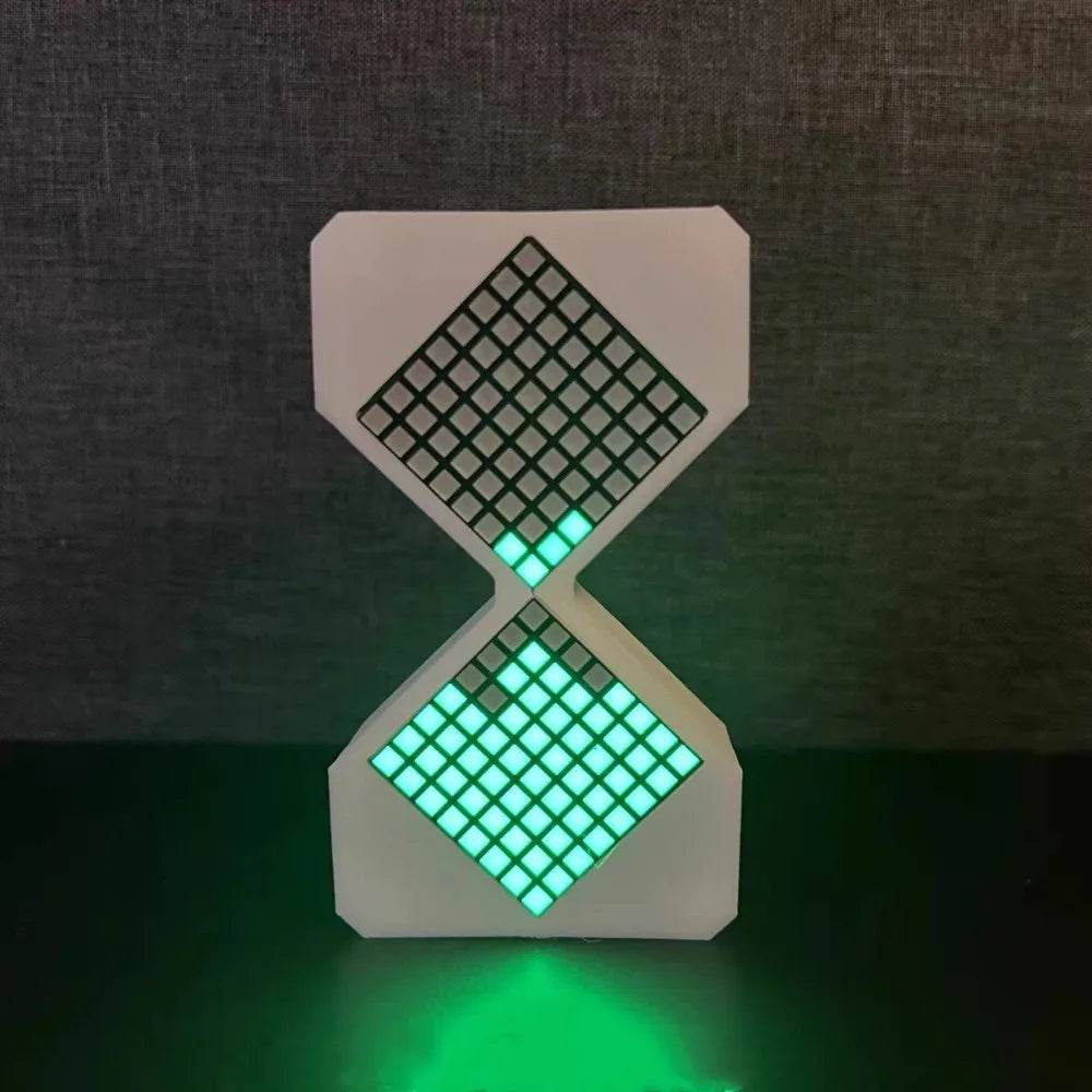 A white LED electronic hourglass timer with a diamond shape, glowing bright green.