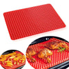 Red silicone BBQ pizza mat and baking liner set with cooked chicken pieces