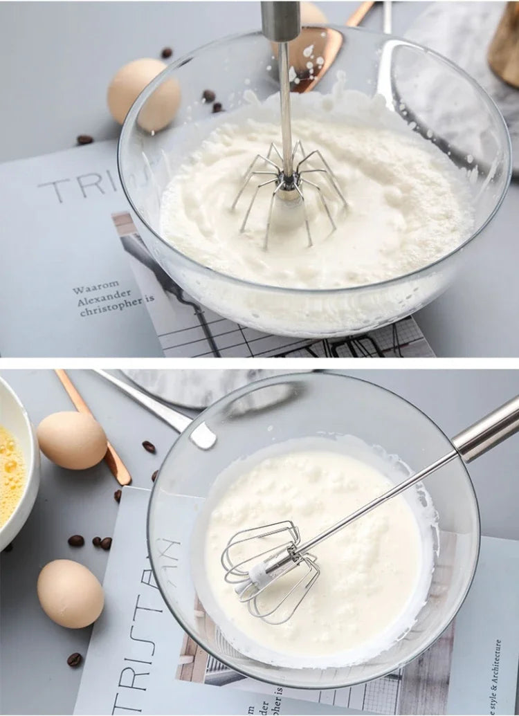 A stainless steel semi-automatic egg beater is used to whip white liquid in a glass bowl.