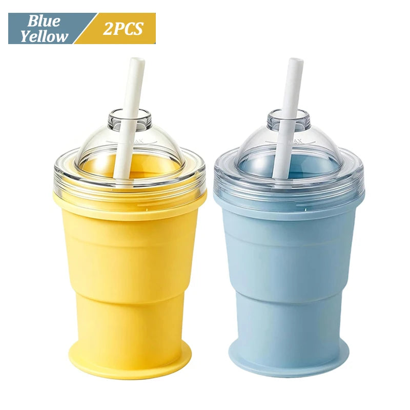 Two reusable silicone ice ball cups with straws in blue and yellow colors