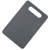 A gray plastic cutting board with a handle, shown from above.