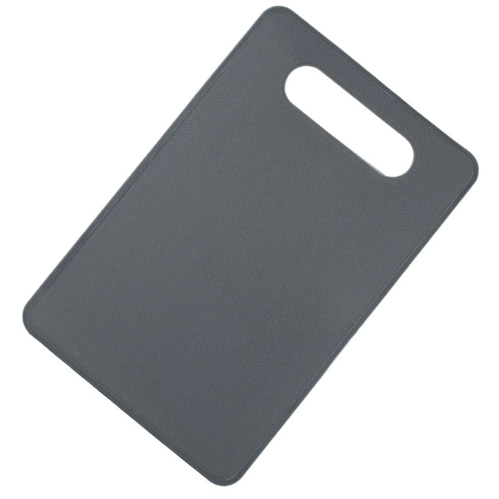 A gray plastic cutting board with a handle, shown from above.