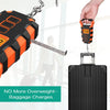 A hand is hanging a digital luggage scale onto a suitcase handle to measure weight.