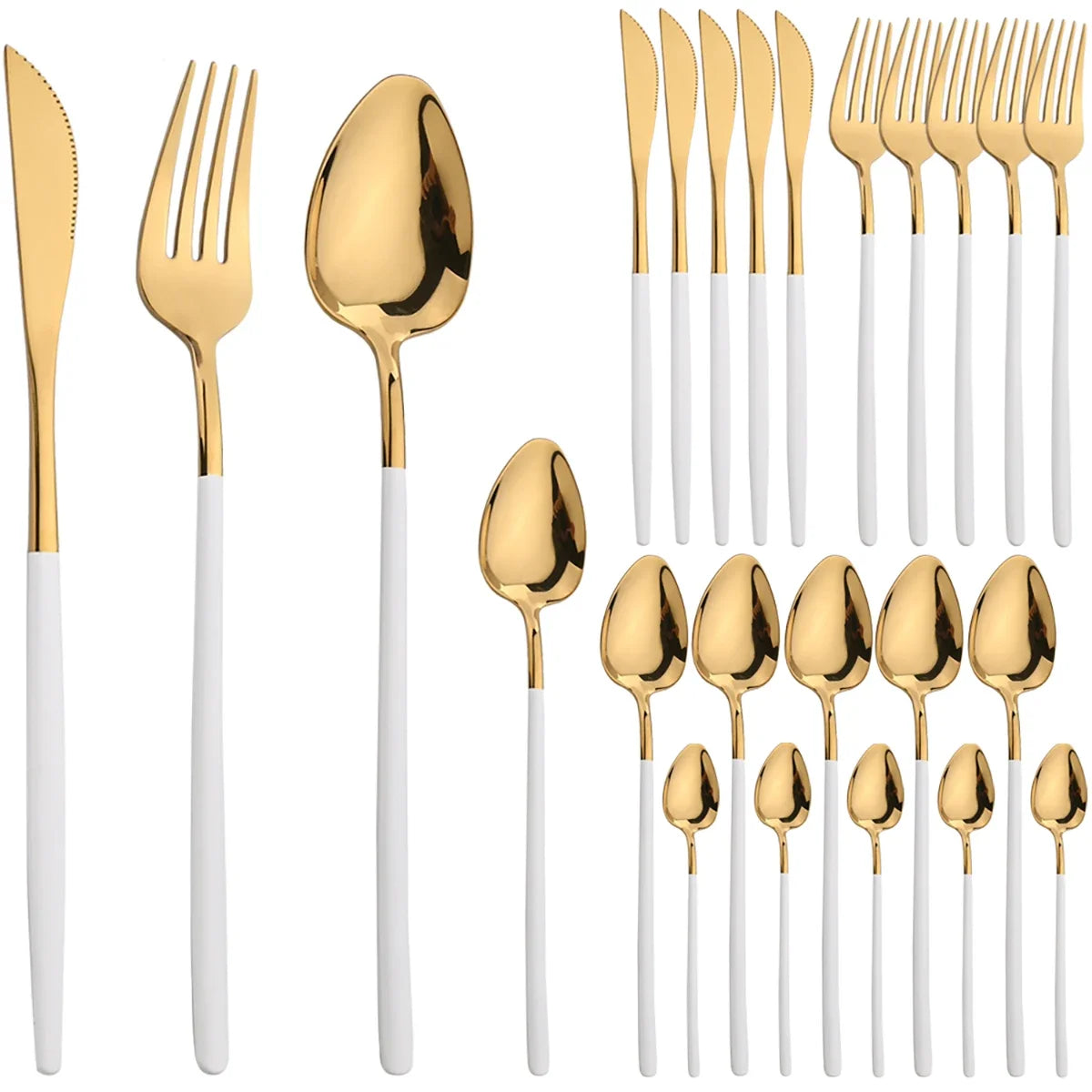 A set of gold and white stainless steel cutlery including forks, spoons, and knives for formal dining.