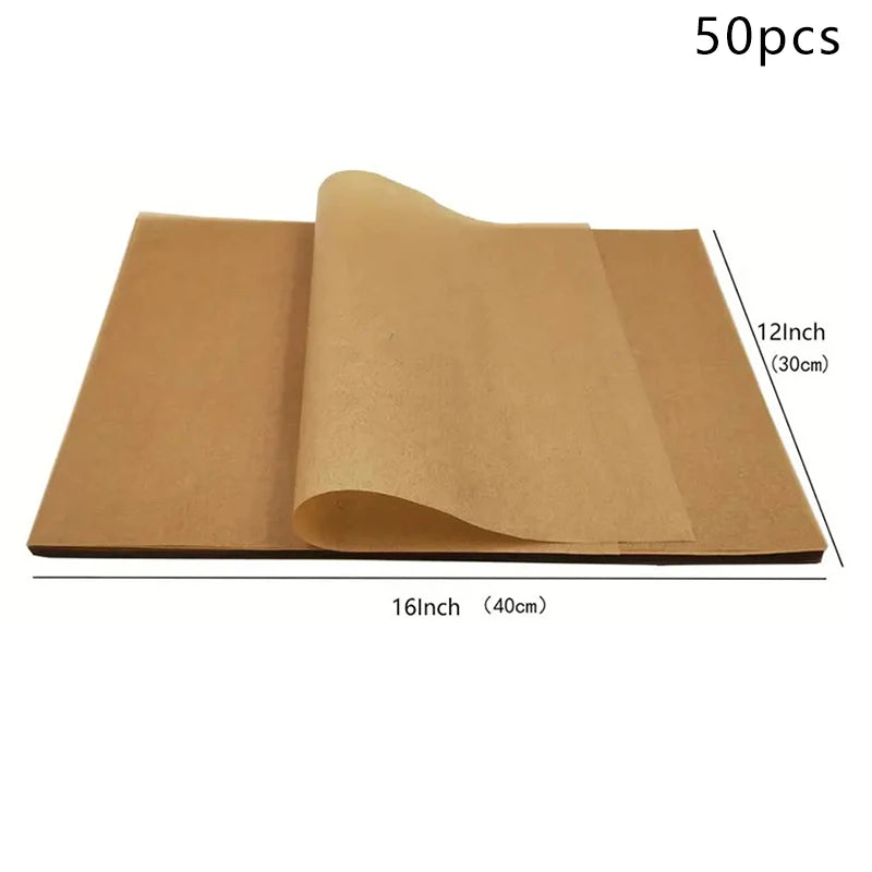 A roll of tan non-stick baking parchment paper, measuring 16 inches by 12 inches.
