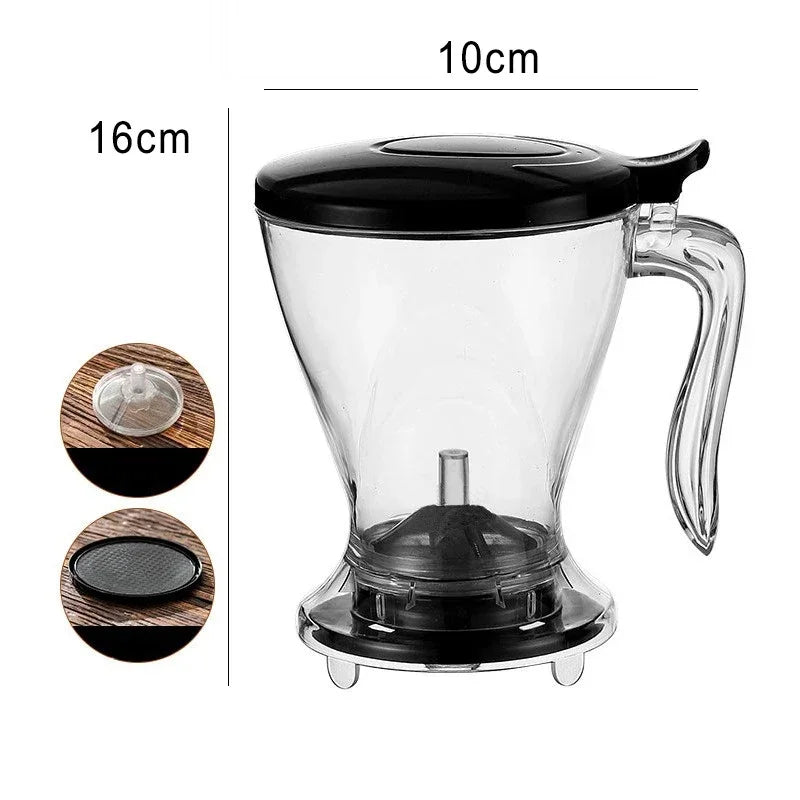 A clear glass pour over coffee dripper with a black lid and stand, shown next to dimension markers.