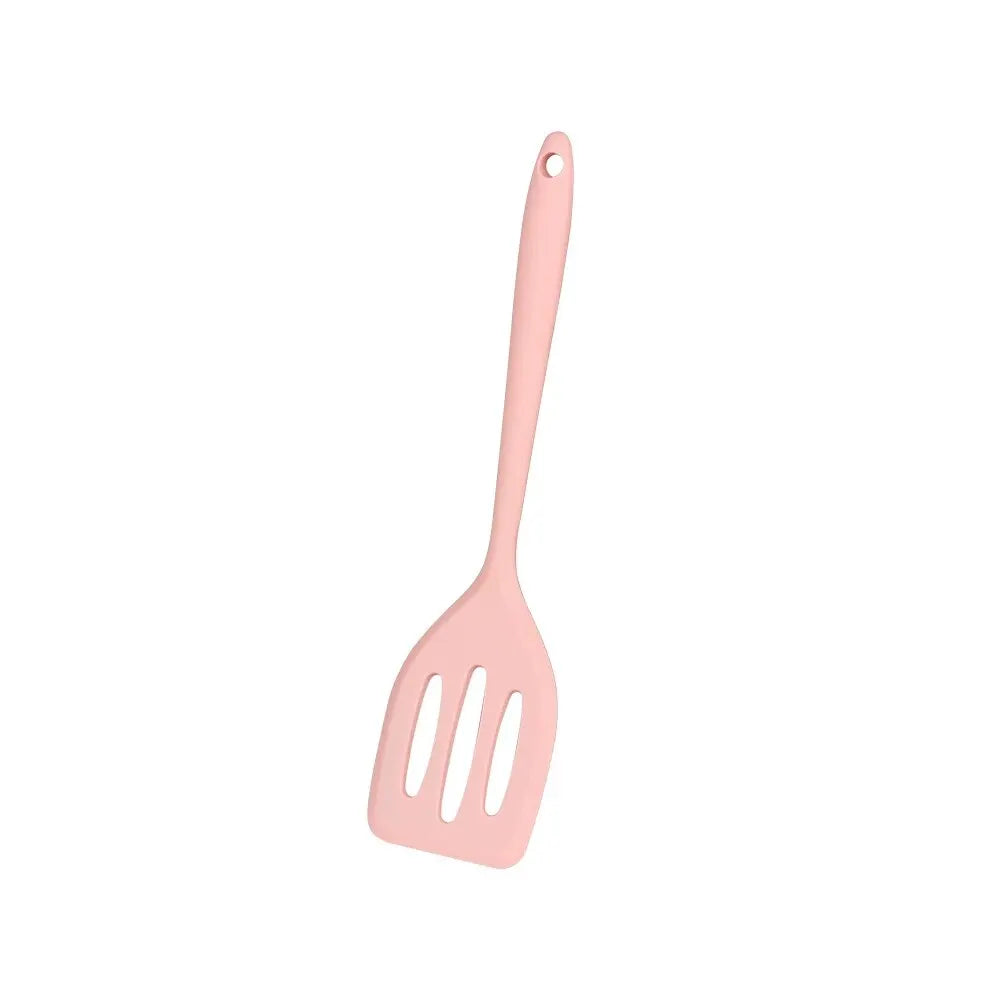 A pink silicone flat bottom frying spatula with a long handle.