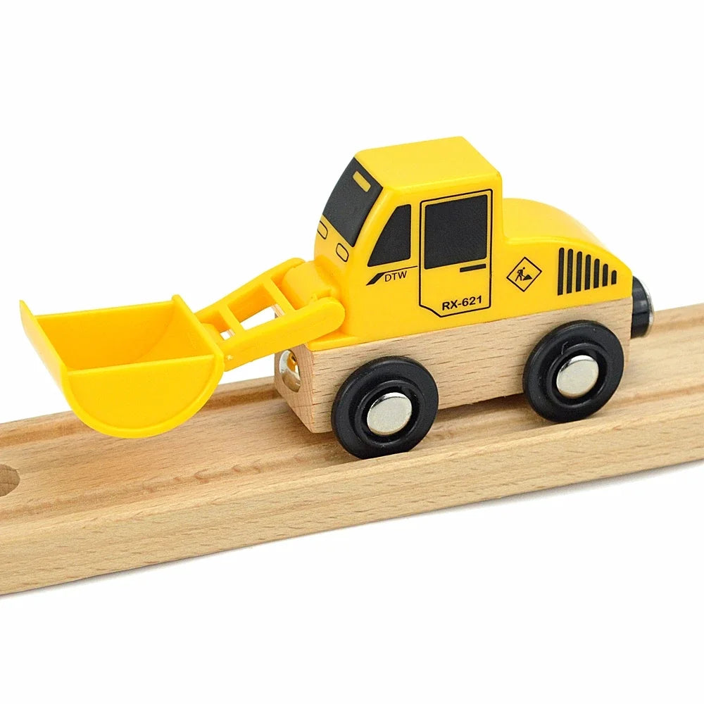 Yellow wooden train car set with a scoop attached, featuring a black cab and wheels.