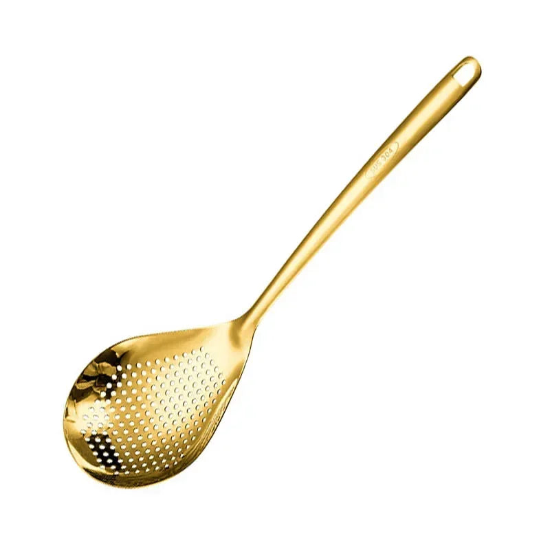 A golden stainless steel colander or strainer with a long handle.