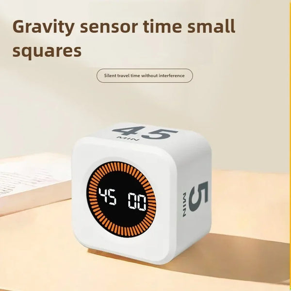 Temporizador cubo de productividad blanco mostrando 45 minutos y 0 segundos sobre una superficie de madera.