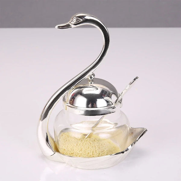Silver elegant condiment storage jar set with a curved lid and a glass bowl for holding seasonings