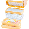 A stackable silicone ice cube tray set with a storage bin and an ice cube is shown being held above the trays.