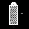 A black and white stencil design featuring a repeating chevron pattern on a white background.