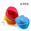 A set of six silicone muffin and cake baking molds in various colors including red, yellow, pink, and blue.