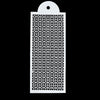 A white plastic cake stencil with an intricate geometric pattern on a black background.