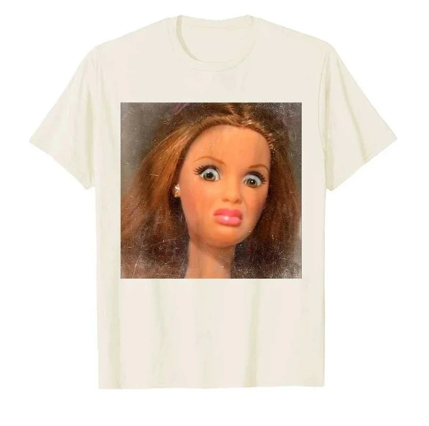 A white t-shirt featuring a close-up image of a woman's face used as a meme.