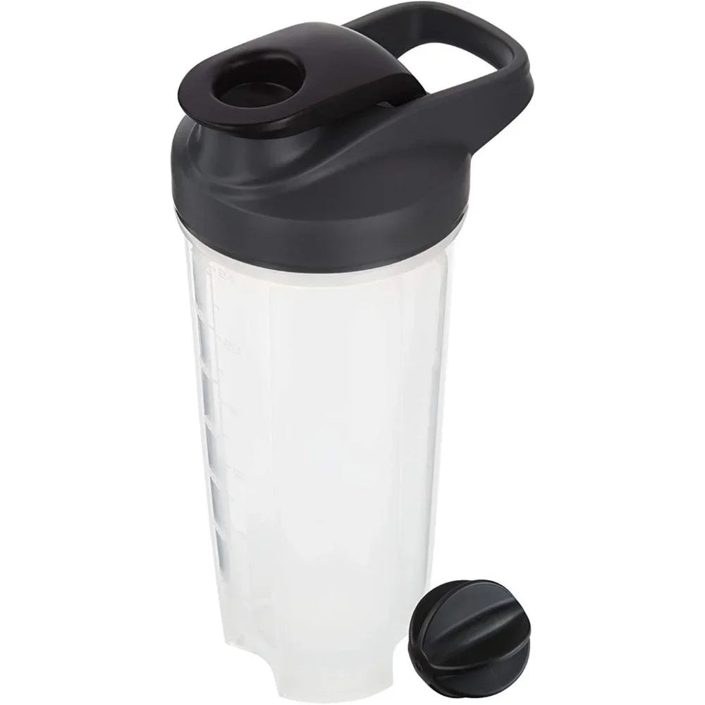 A clear plastic protein shaker bottle with a black blender whisk and cap.