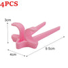 Four pink silicone finger guard chopsticks used for snacks and gaming