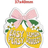 A pink and yellow craft kit featuring lemon and peasy squeezy fruit shapes.