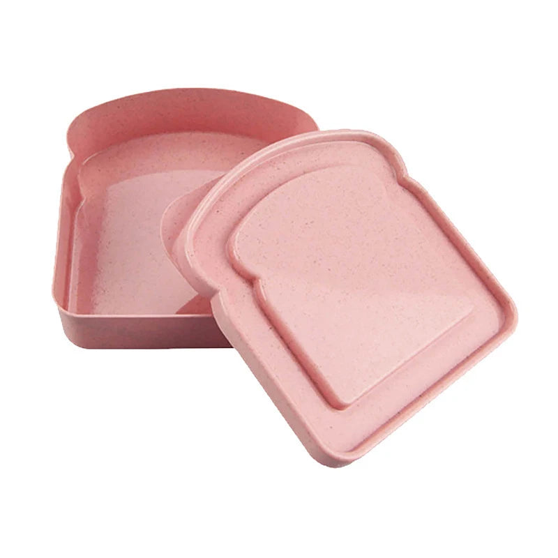 A pink reusable microwave sandwich container with a lid shown from above.