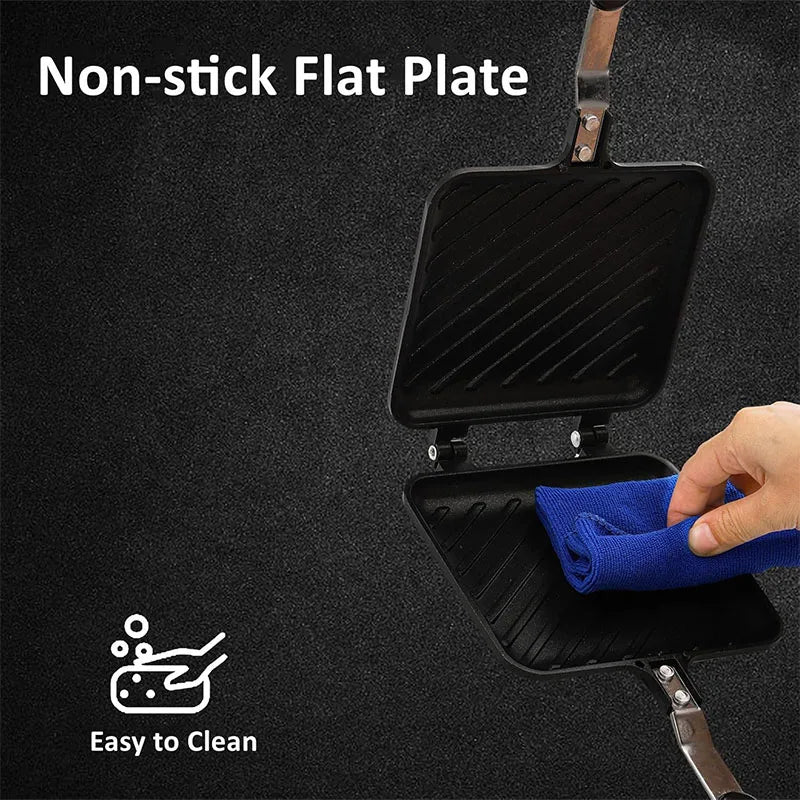 A black non-stick flat plate pan is shown being cleaned with a blue cloth.