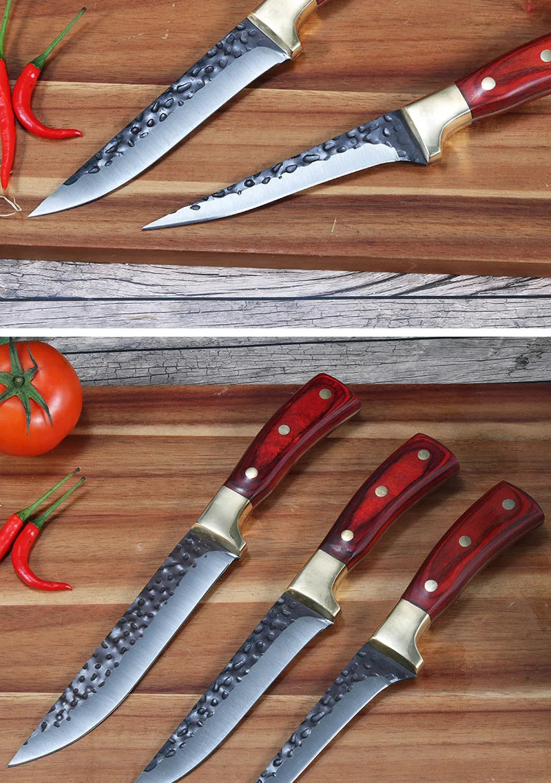 A set of three forged stainless steel kitchen knives with wooden handles and silver blades are displayed on a wooden surface.