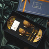 A luxury bone china tea set featuring ceramic cups and saucers presented in a dark box.