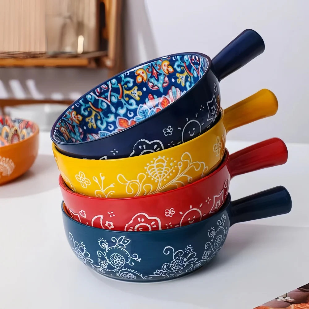A stack of hand-painted ceramic salad bowls in various colors including blue, yellow, and red.