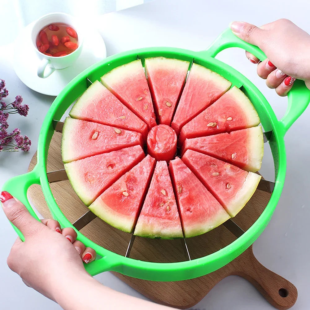 A hand holds a green watermelon slicer with twelve wedges cut into a circular pattern on a wooden board.