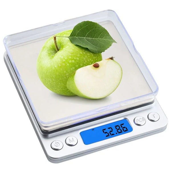 Eine hochpräzise digitale Waage misst einen Apfel mit einem Gewicht von 52,86 Gramm.