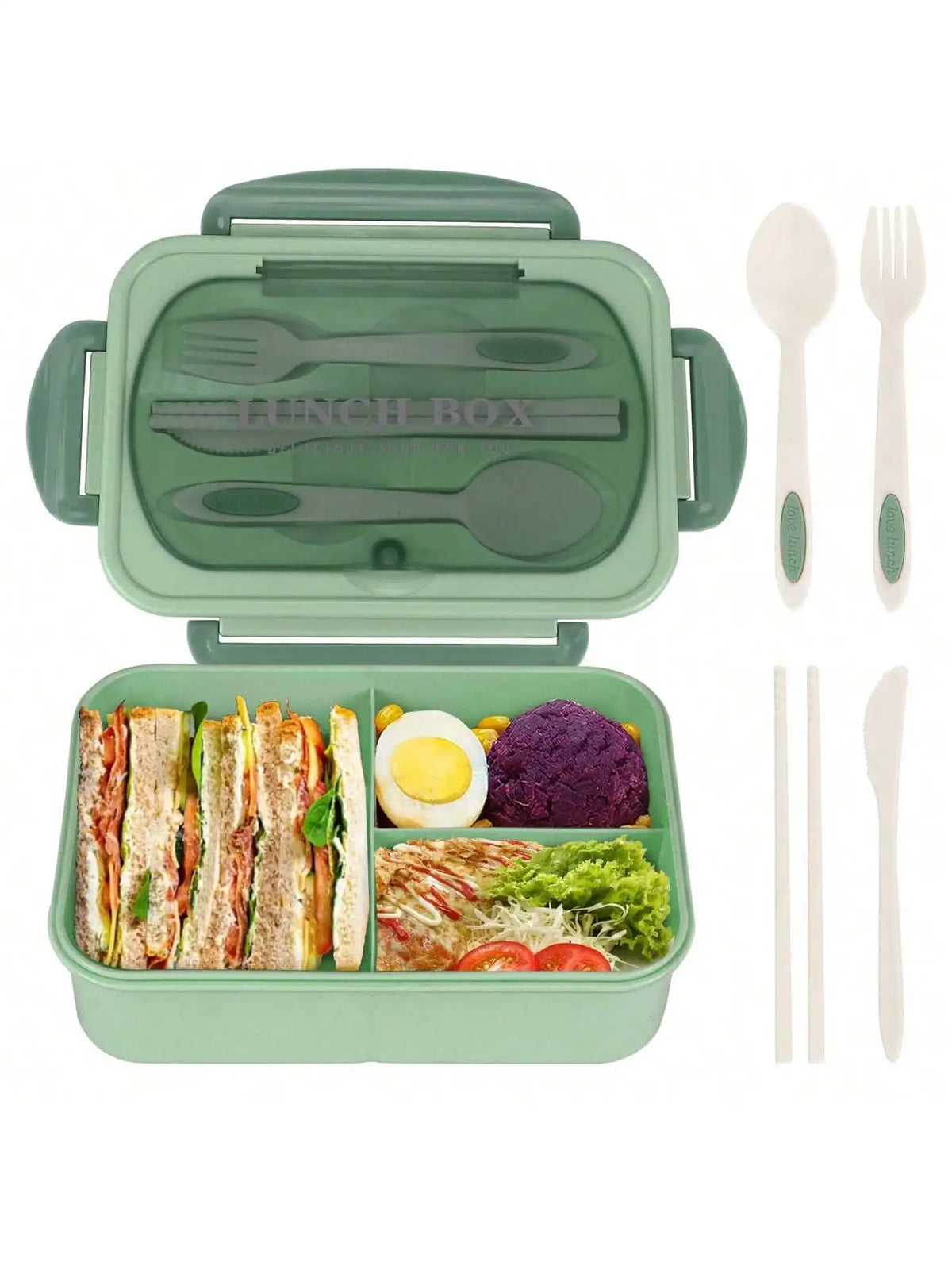 Set de hộp bento verde con compartimento principal para comida, tapa y utensilios como tenedores y palillos.