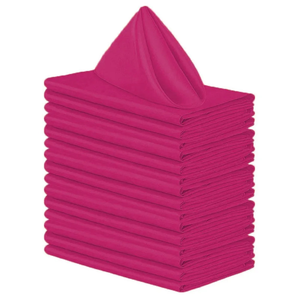 A stack of ten bright pink satin dinner napkins.