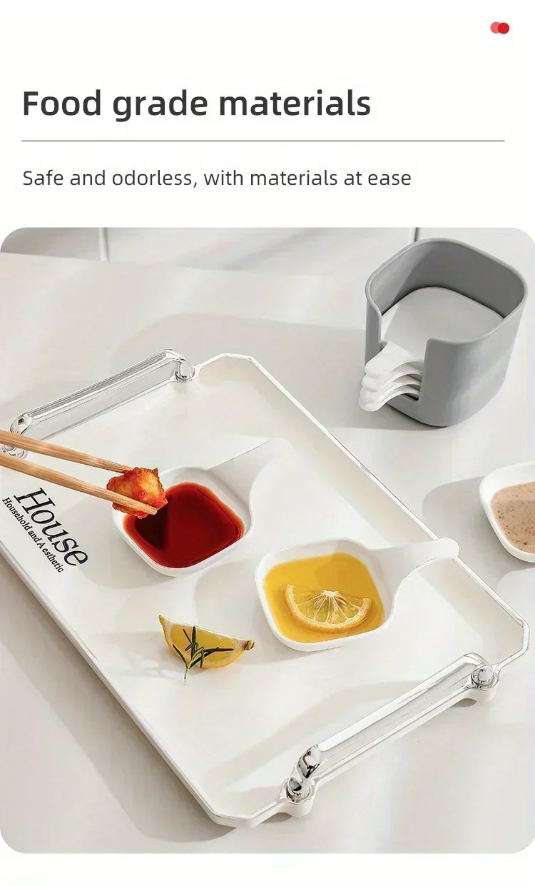 A white food grade plastic dish set featuring various small compartments for seasoning and serving sauces like tomato, oil, a