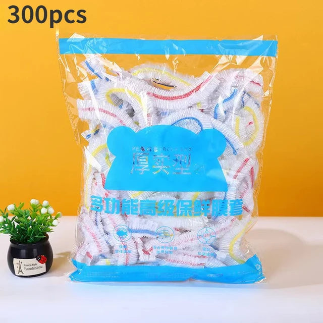 A clear plastic bag filled with 300 pieces of colorful disposable plastic food covers