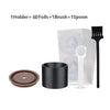 A set of reusable Nespresso Vertuo capsule kit including a holder, foils, brush, and spoon.