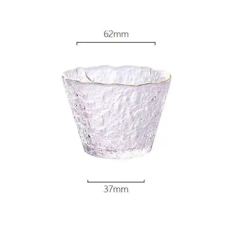A clear glass tea bowl with a textured, fluted rim, measuring 62mm high.