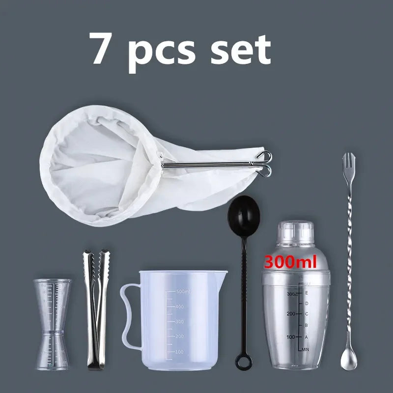 A set of seven plastic cocktail tools including a shaker, strainer, spoon, and measuring cups.