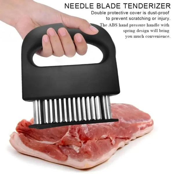 A hand holds a black double protective cover needle blade tenderizer with a stainless steel grid over a piece of raw meat.