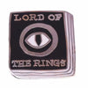A black enamel pin featuring the text LORD OF THE RINGS and a stylized eye design.