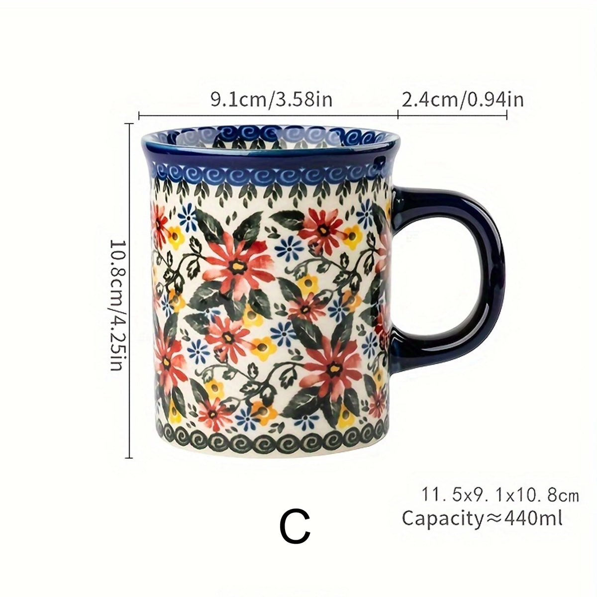 A ceramic mug with a blue and white floral pattern featuring pink, red, and yellow flowers.