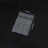 A transparent cookie bag filled with small white dots, showing the size dimensions 7cm/3.7" by 10cm/3.9".