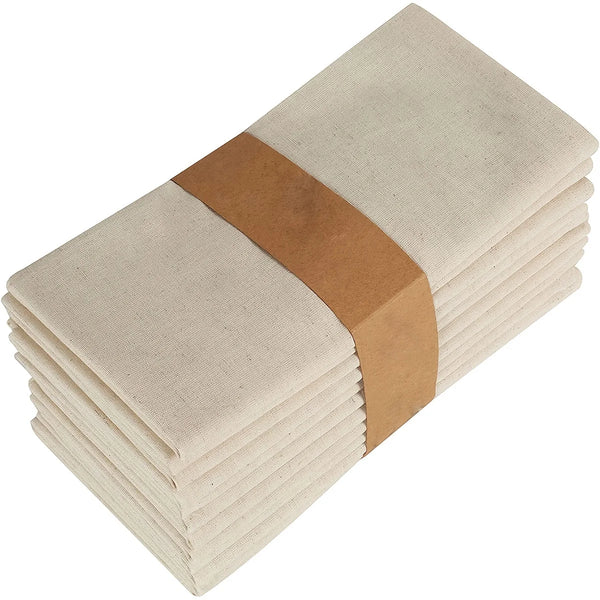 Stapel dekorativer Tischservietten in Beige mit braunem Band