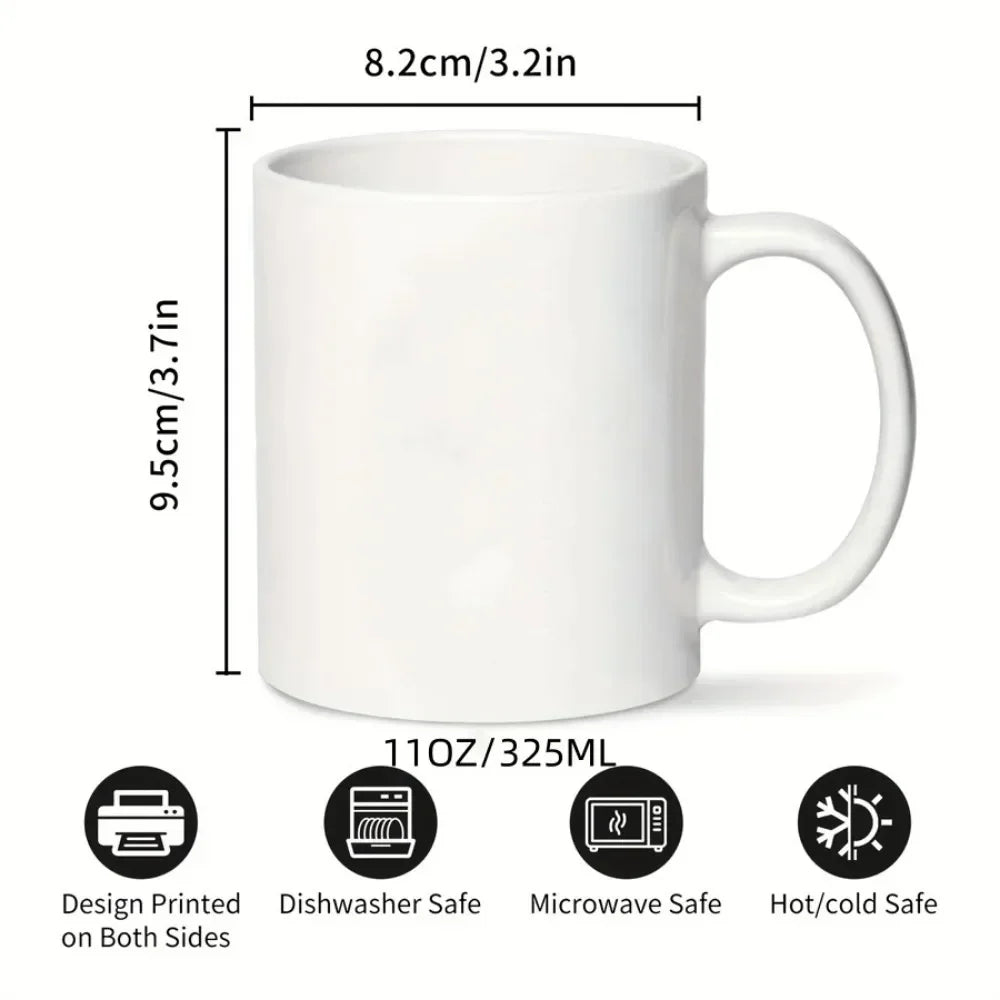 White reusable ceramic coffee mug with handle, safe for dishwasher, microwave, and hot/cold use.