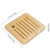 A wooden tea strainer or infuser with parallel slots, measuring 19.5cm by 7.68inch.