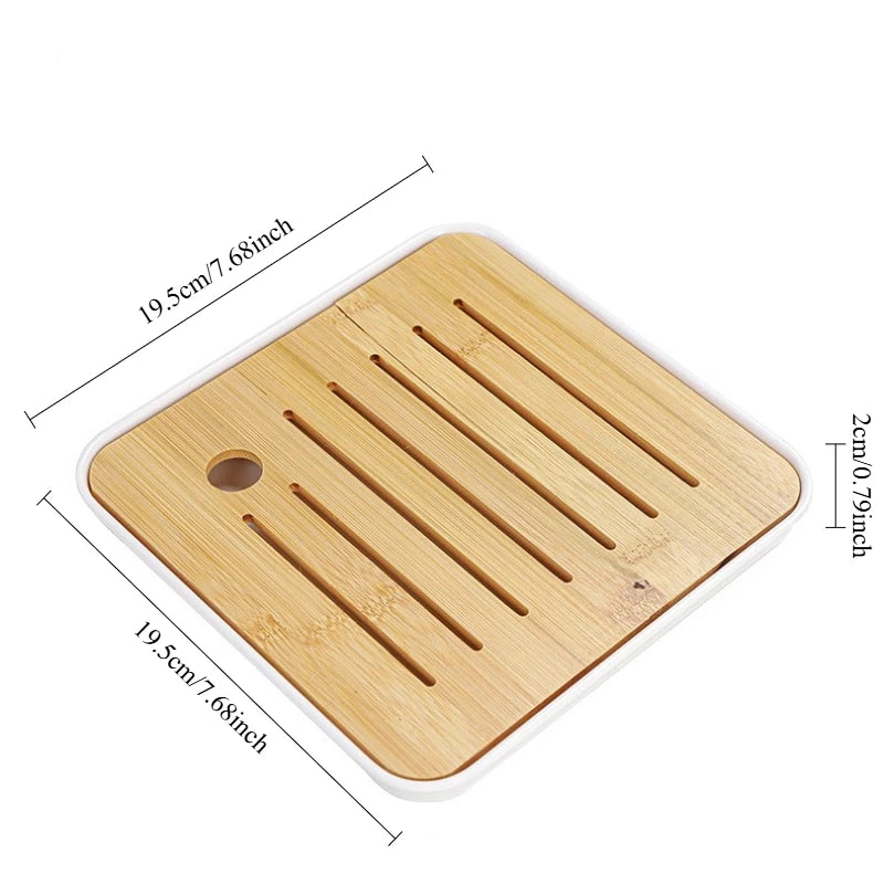 A wooden tea strainer or infuser with parallel slots, measuring 19.5cm by 7.68inch.