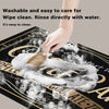 A hand is wiping a reusable non-slip dish drying mat clean with water.