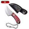 A black leather folding fruit knife with a stainless steel blade and a metal keychain attached.