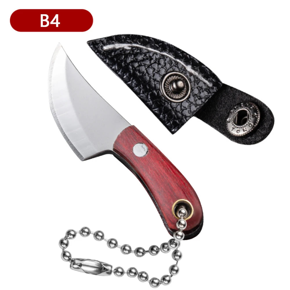 A black leather folding fruit knife with a stainless steel blade and a metal keychain attached.